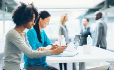 Two women working at desk